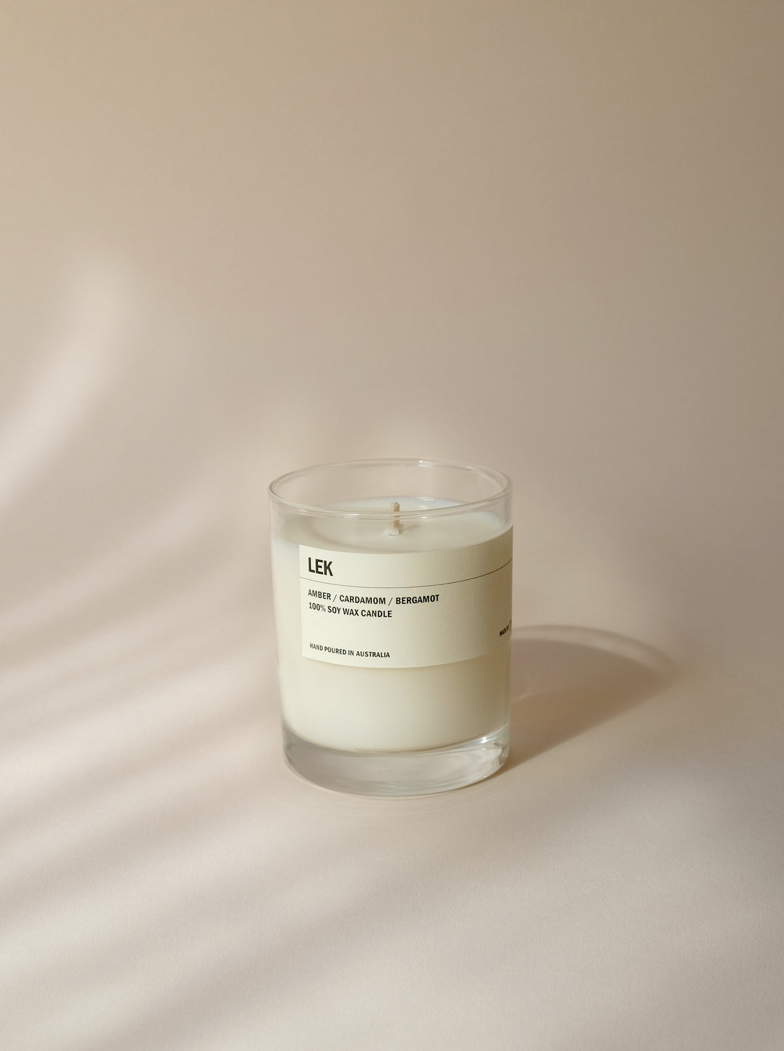 LEK: Amber / Cardamom / Bergamot Clear Candle 300g