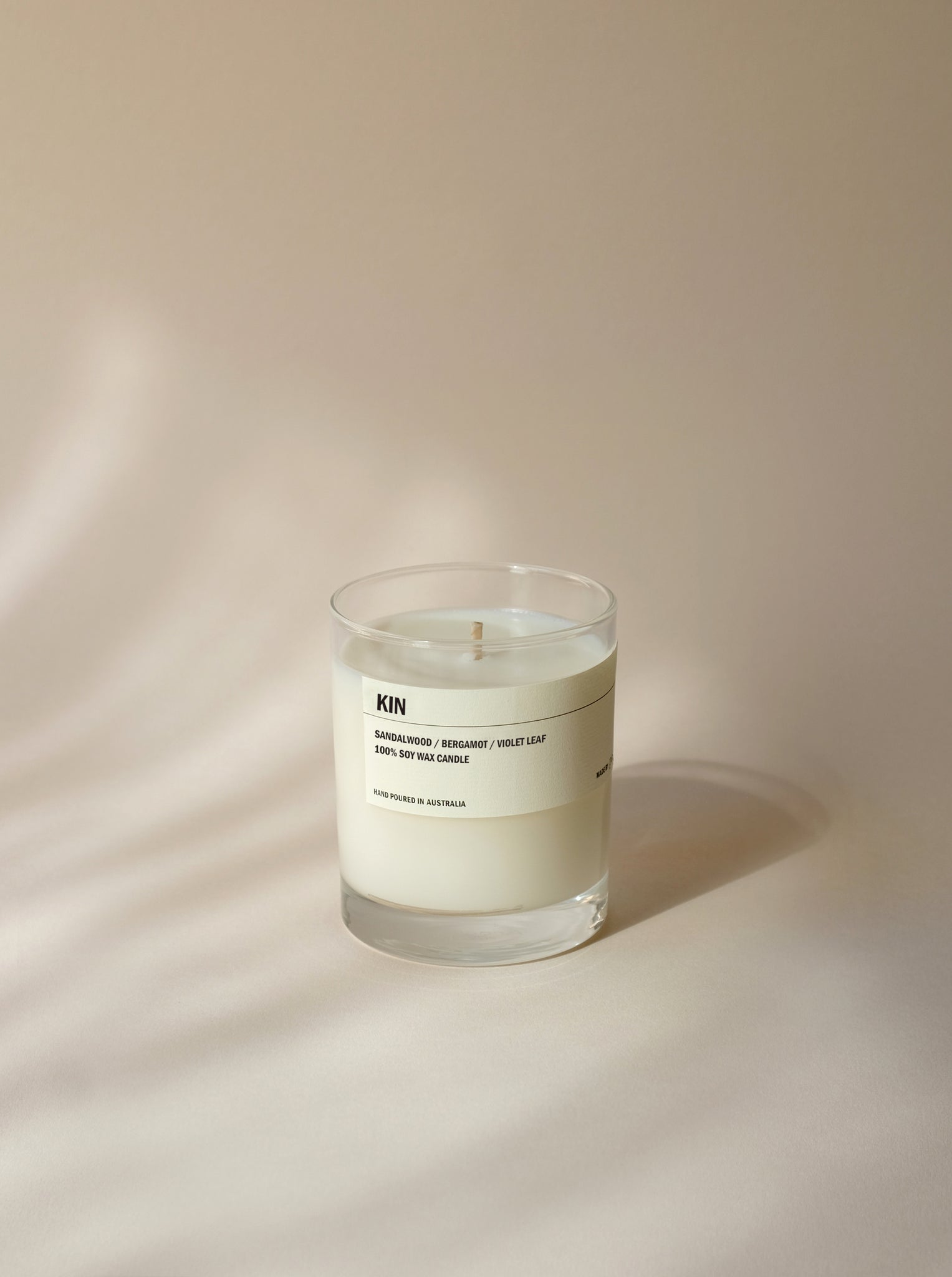 KIN: Sandalwood / Bergamot / Violet Leaf Clear Candle 300g